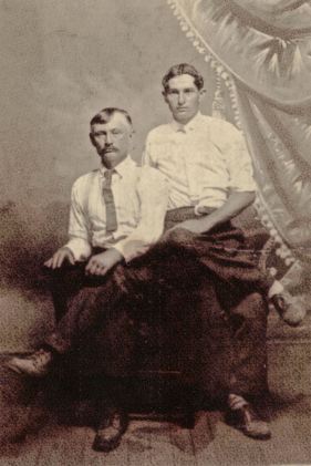 Great-grandpa Will, seated, and Uncle Luther as a young man.