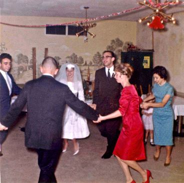 Dancing the hora to the jukebox at my wedding to Mike. Left to right, Roy, Mike's brother, me, Mike, my sister Audrey, my sister-in-law Rose. Bonnie is in the circle but out of the picture.